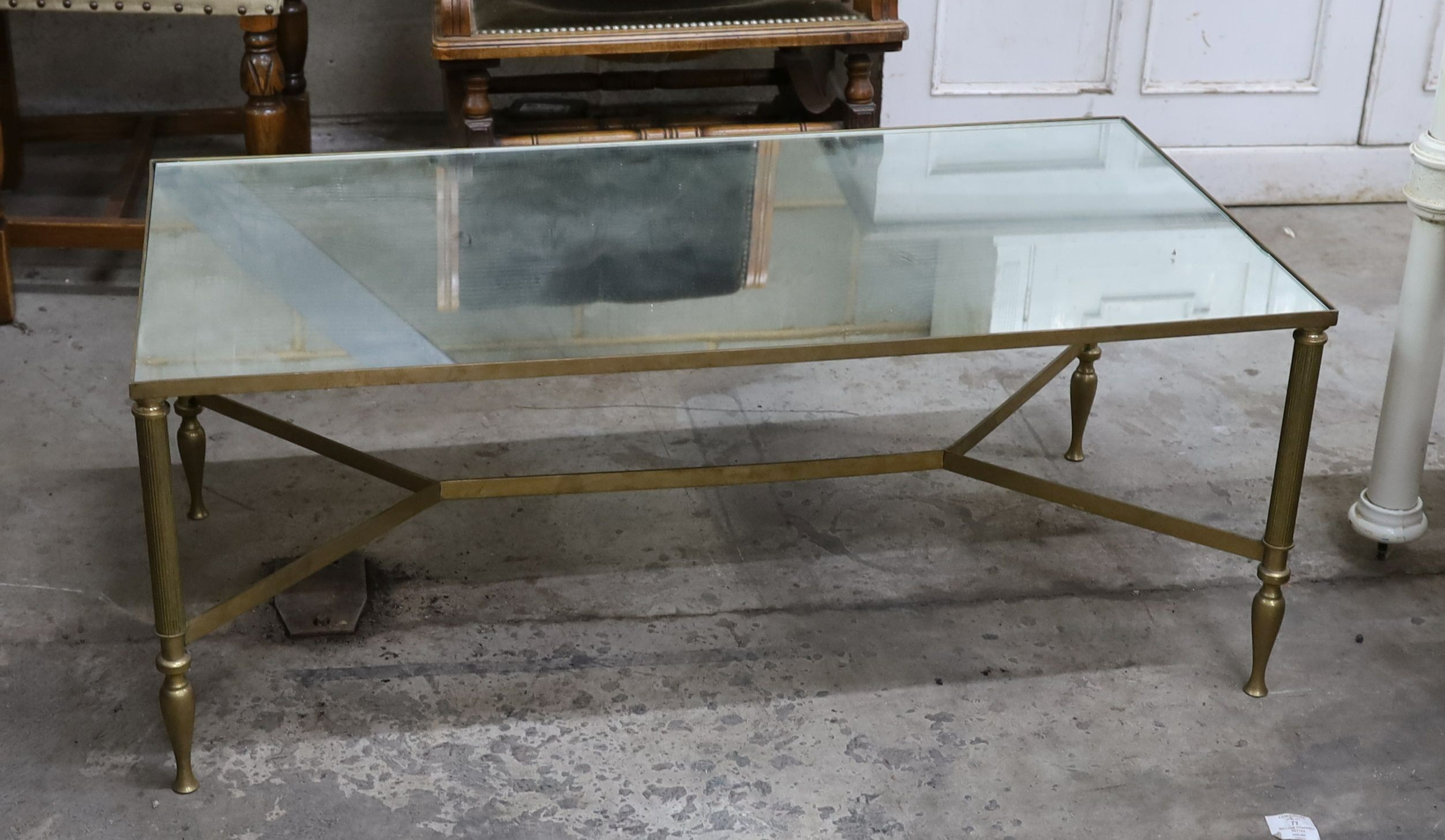 A Maison Jensen style rectangular brass coffee table with mirrored glass top, length 100cm, depth 50cm, height 40cm